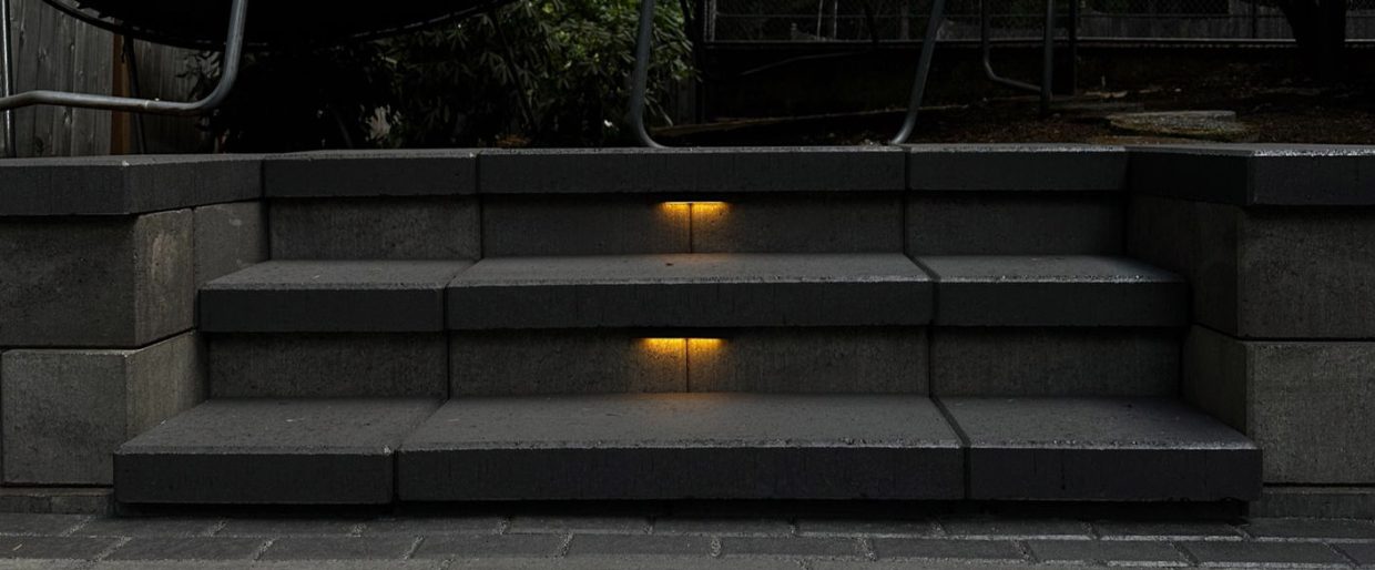 Illuminated retaining-wall steps completed by Weeping Willow